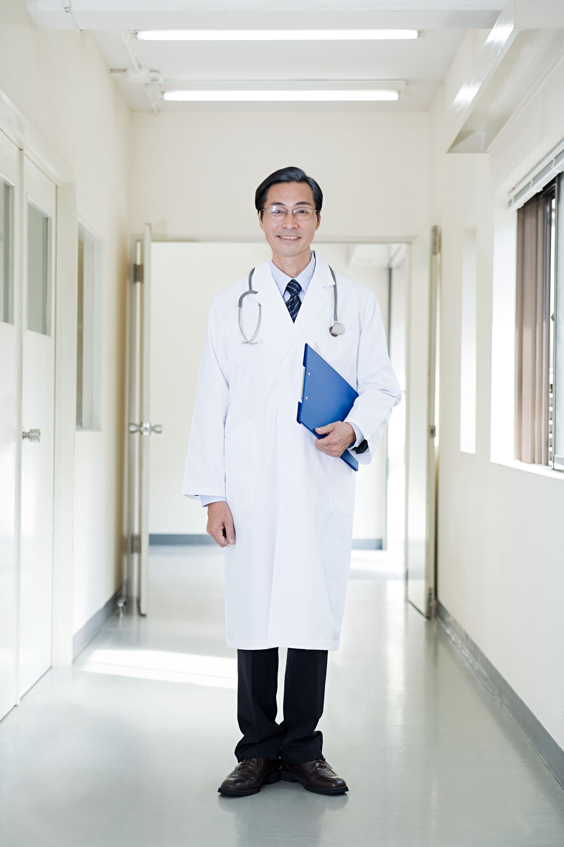 Doctor in hospital corridor